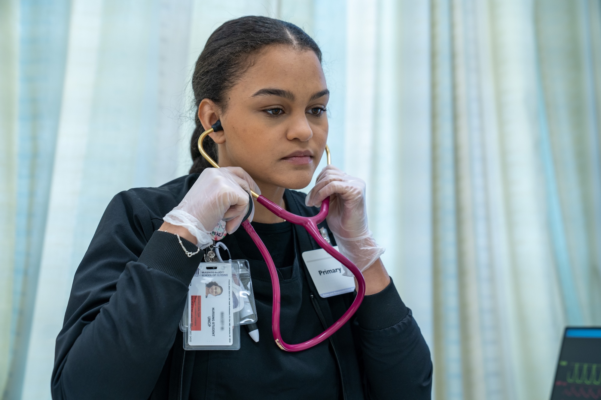 UNCP nursing student with a stethoscope